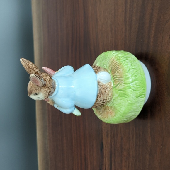 Schmid porcelain music box. Peter spins when the music plays, It's a Small World - Picture 2 of 4